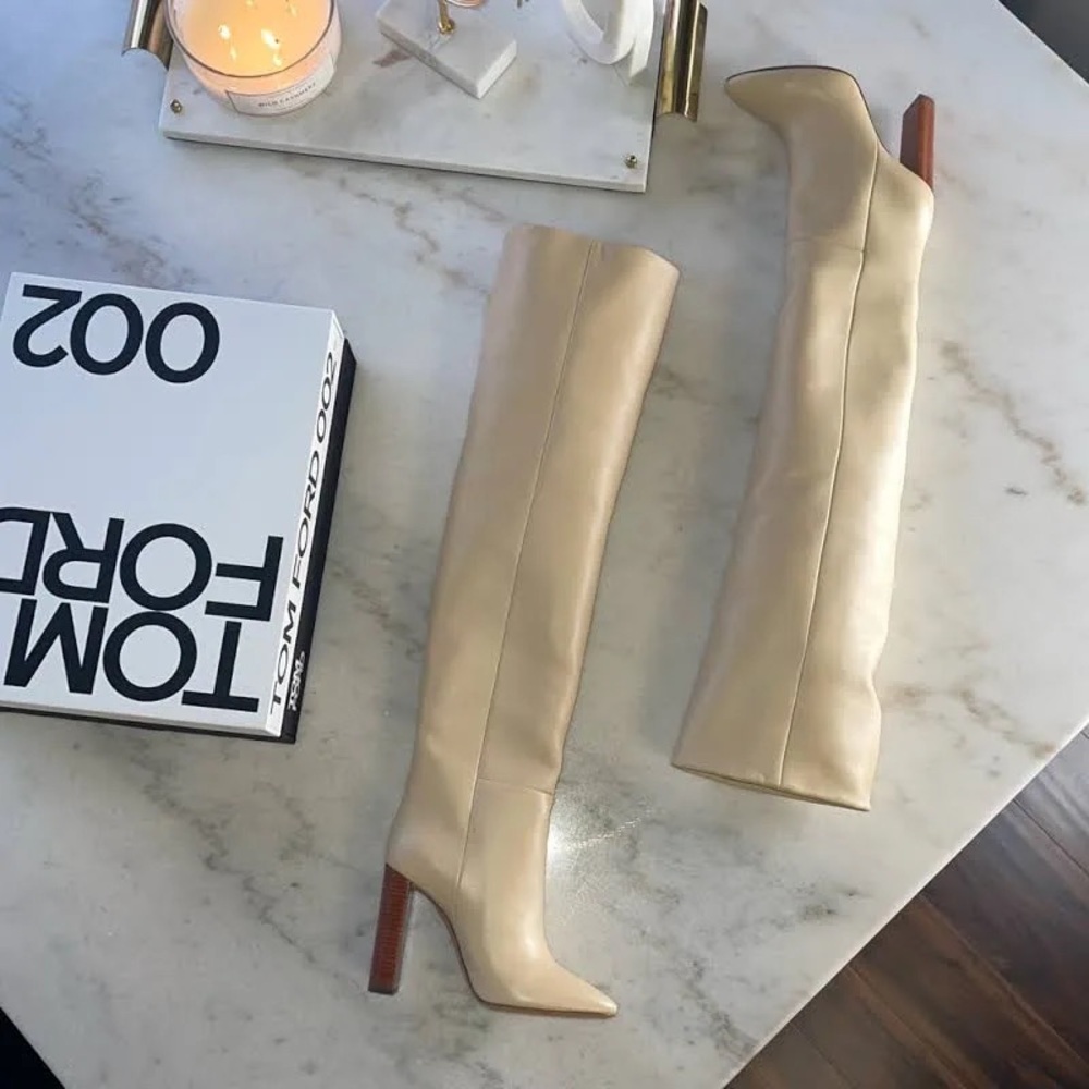Authentic Saint Laurent Crème boots.